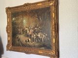 a painting hanging on the wall of a room