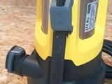 a yellow and black submerst that is on the floor