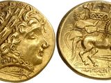 a gold coin with an image of a man on a horse