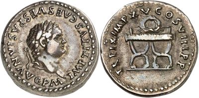 a silver coin with an image of a woman on it