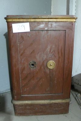 a small wooden cabinet with a door on it