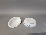 a small bowl and a smaller bowl sitting on a table