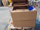 boxes stacked on top of each other on a pallet in a warehouse