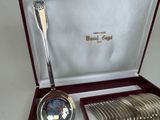 a box with a set of silverware in it