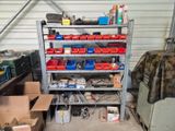 a garage with a lot of tools on the shelves