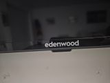 a sign that says edenwood on the back of a laptop
