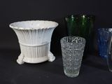 three vases sitting next to each other on a table