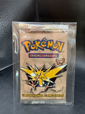 a close up of a pokemon trading card game in a plastic case