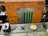 a machine that is sitting inside of a warehouse