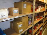 many boxes that are sitting on the shelves in the room