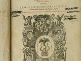 an old book with a picture of a snake on it