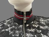 black and white lace jacket with red and white striped collar