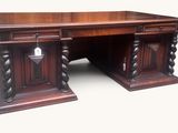 an image of a large wooden desk with two pedestals