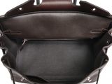 a close up of the inside of a brown leather handbag