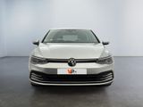 the front view of a white volkswagen vw golf in a showroom