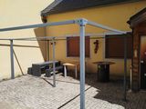 an image of a patio with a table and chairs
