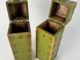 two small wooden boxes that are sitting on a table