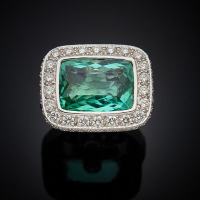 an emerald and diamond ring