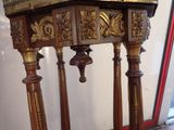 a wooden table with a clock on top of it