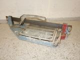 a picture of a metal cutting machine on the floor