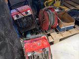 a picture of a room that has a lot of tools on the floor