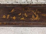 a coffee table with a bird design on it