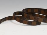brown and black checkered dog leash with gold hardware