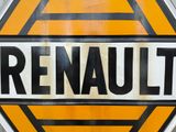 a yellow and black sign that says renaultt on it