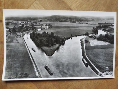 a black and white photo of a boat on the water