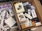 many boxes of electronic devices sitting in a carton