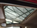 a rear view mirror of a car with a skylight