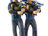 two figurines of two men dressed in uniforms holding baseball bats