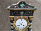 a clock that is sitting on top of a table