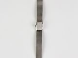 a close up of a watch on a white surface with a white background
