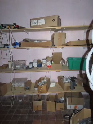 a room with a lot of boxes and boxes on the floor