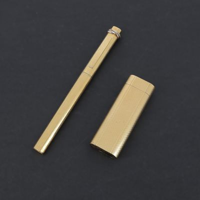CARTIER Ensemble composé d'un briquet et d'un stylo trinity.