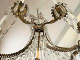 a chandelier that is hanging from the ceiling