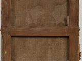 an old wooden window frame with a burlock cloth covering the window