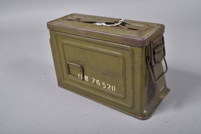 a small metal box with a metal handle on it
