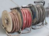 a lot of reels that are sitting on a table