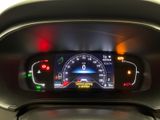 a car dashboard with a speedometer and a clock on it