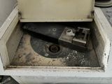 a dirty sink in a dirty room with a broken faucet