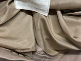 a close up of a piece of clothing with a label on it