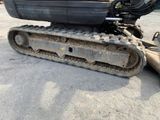 an image of a construction vehicle that is sitting on the ground