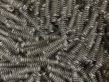 a close up of a bunch of metal spirals