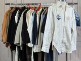 a rack of clothes that is hanging on a clothes rack