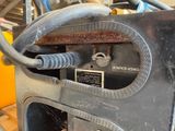 a close up of a machine that is being worked on