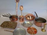 many different types of pots and pans on the table