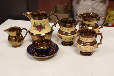 a table with a lot of cups and saucers on it