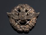 an image of a badge on a black surface